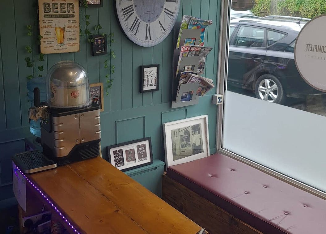 Cozy waiting area at The Complete Barber Shop Cowfold, featuring modern decor in Cowfold, England, GB.