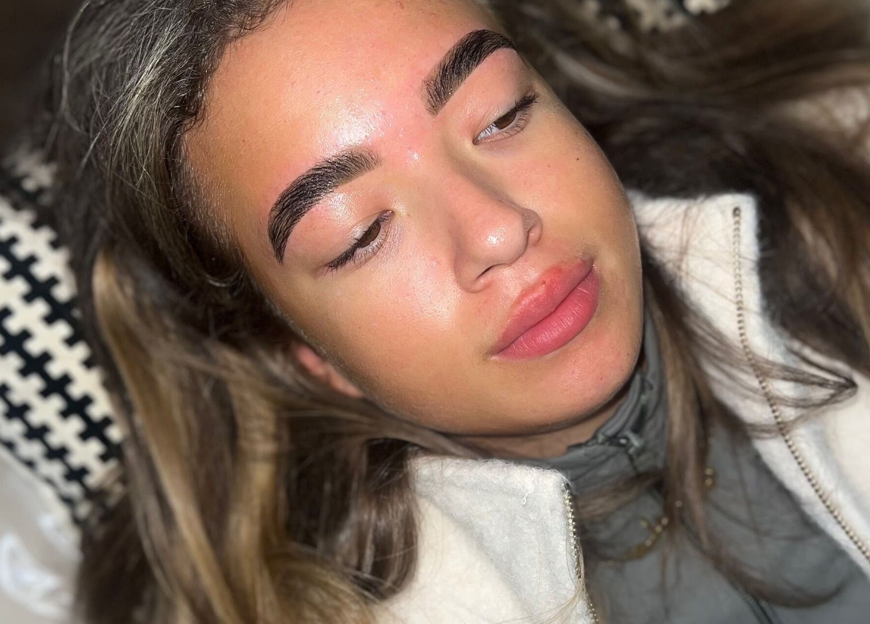 Close-up of a woman's defined eyebrows after treatment at Browella_bypaige, Wallasey, England, GB.