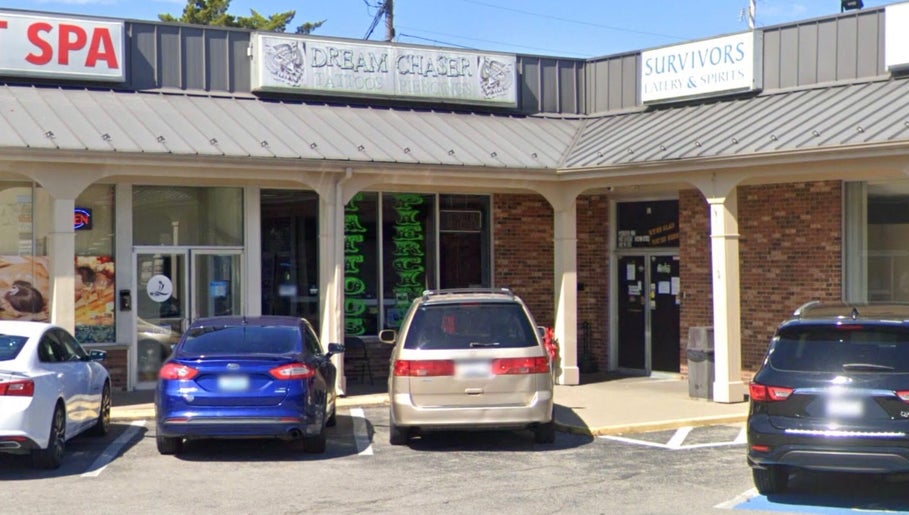 Front view of Tat2Guru - Dream Chaser Tattoo LLC in Lexington, Kentucky, US, showcasing the entrance and signage.