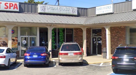 Front view of Tat2Guru - Dream Chaser Tattoo LLC in Lexington, Kentucky, US, showcasing the entrance and signage.