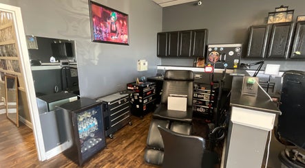 Tat2Guru - Dream Chaser Tattoo LLC interior in Lexington, Kentucky, US showcasing a stylish workstation.