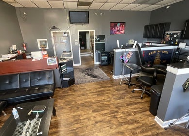Interior of Tat2Guru - Dream Chaser Tattoo LLC in Lexington, Kentucky, US showcasing modern tattoos workspace.