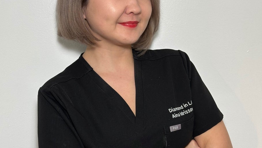 Professional at Diamond in LA, Los Angeles, California, US, posing confidently in stylish black attire.