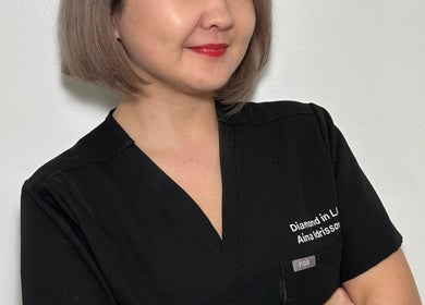 Professional at Diamond in LA, Los Angeles, California, US, posing confidently in stylish black attire.
