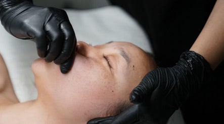 Facial massage at Face Studio LA, Los Angeles, California, US, promoting relaxation and skincare.