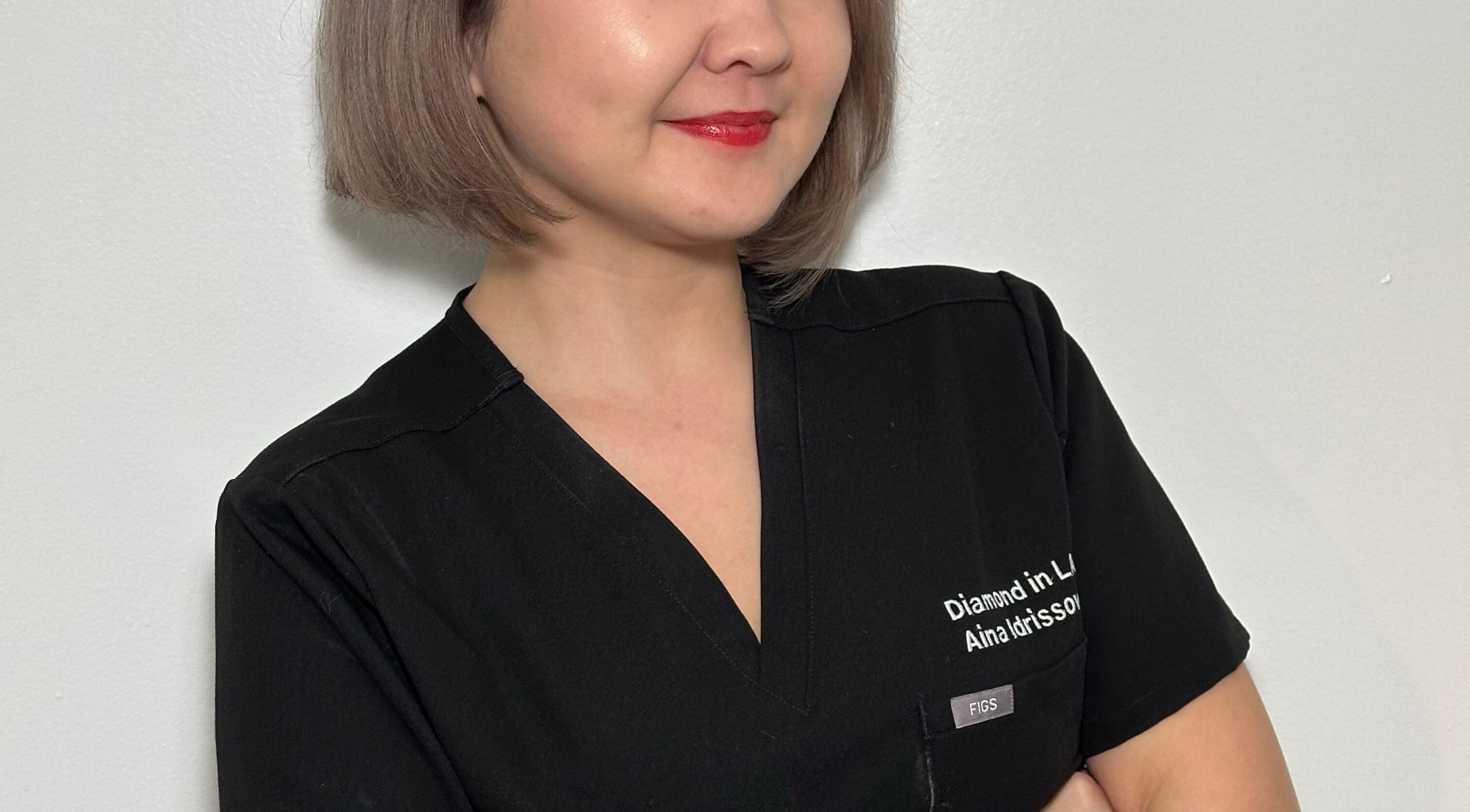 Professional at Face Studio LA, Los Angeles, California, US, in stylish attire, ready to enhance beauty.