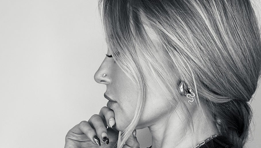 Stylish side view of a woman with elegant hair at Amy Curran Hair and Makeup, Altrincham, England, GB.