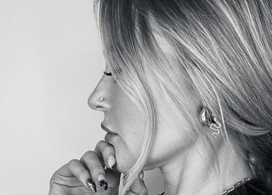 Stylish side view of a woman with elegant hair at Amy Curran Hair and Makeup, Altrincham, England, GB.