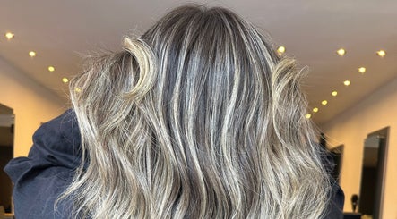Highlighted waves at Amy Curran Hair and Makeup in Altrincham, England, GB. Perfectly styled for shine.