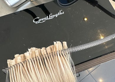 Hair extensions at Amy Curran Hair and Makeup, Altrincham, England, GB, showcasing premium styling tools.