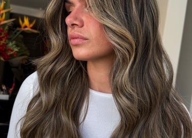 Elegant wavy hairstyle at Amy Curran Hair and Makeup, Altrincham, England, GB.
