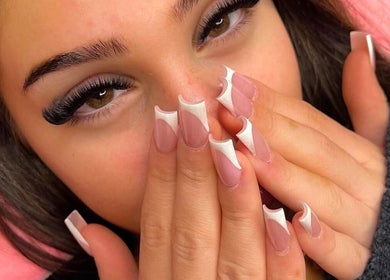 Close-up of elegant nails and lashes at Lashery London, London, Ontario, CA, showcasing artistry and style.