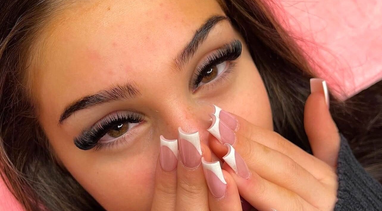 Close-up of eyelash extensions and artistic nails at Lashery London, London, Ontario, CA.
