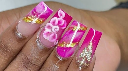 Vibrant pink nail art with gold accents at 24K NAIL SPA, Arlington, Texas, US.