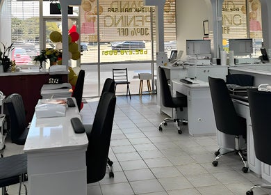 Interior of 24K NAIL SPA in Arlington, Texas, US featuring modern nail stations and bright decor.