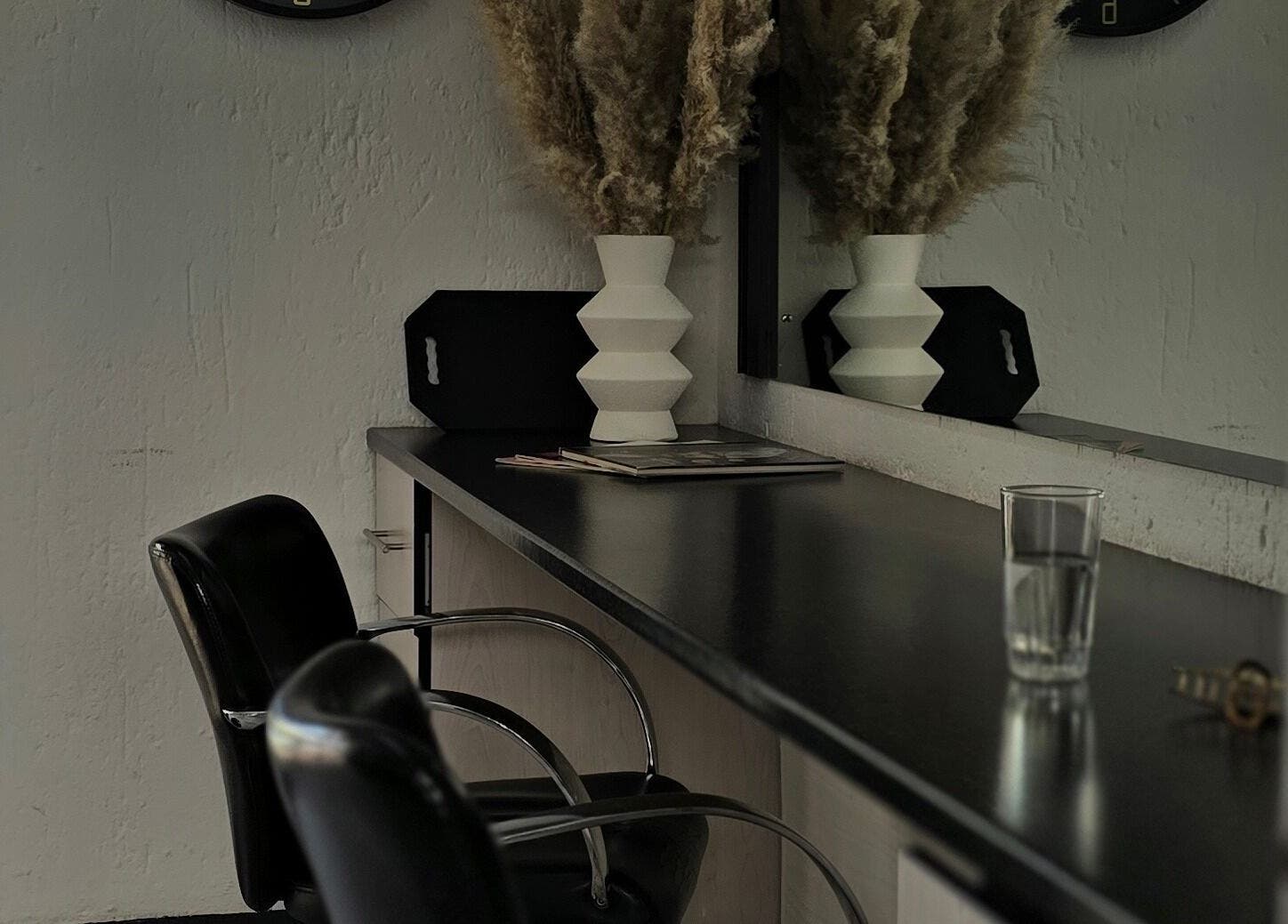 Elegant salon interior at Hair On View, Boksburg, Gauteng, ZA, showcasing sleek styling chairs and decor.