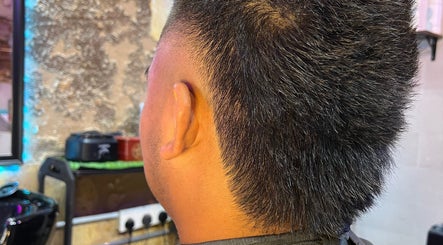 Close-up of a short haircut with a fade at Goblings barbershop in Melaka, Melaka, MY.