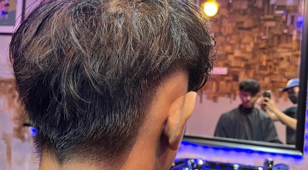 Freshly styled haircut at Goblings Barbershop in Melaka, Melaka, MY under soft lighting.