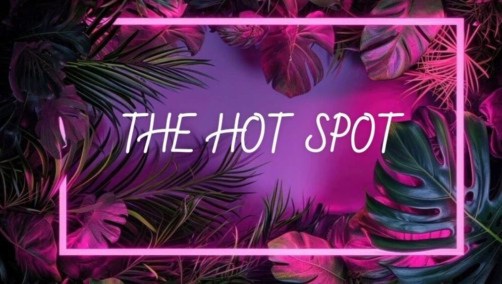 Vibrant tropical design at The Hot Spot, Blooming Grove, Texas, US. Neon lights and lush foliage create allure.