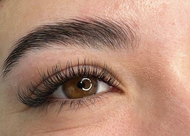 Close-up of an expertly shaped brow at GlowBrows Phi, Vancouver, British Columbia, CA, highlighting precision beauty.