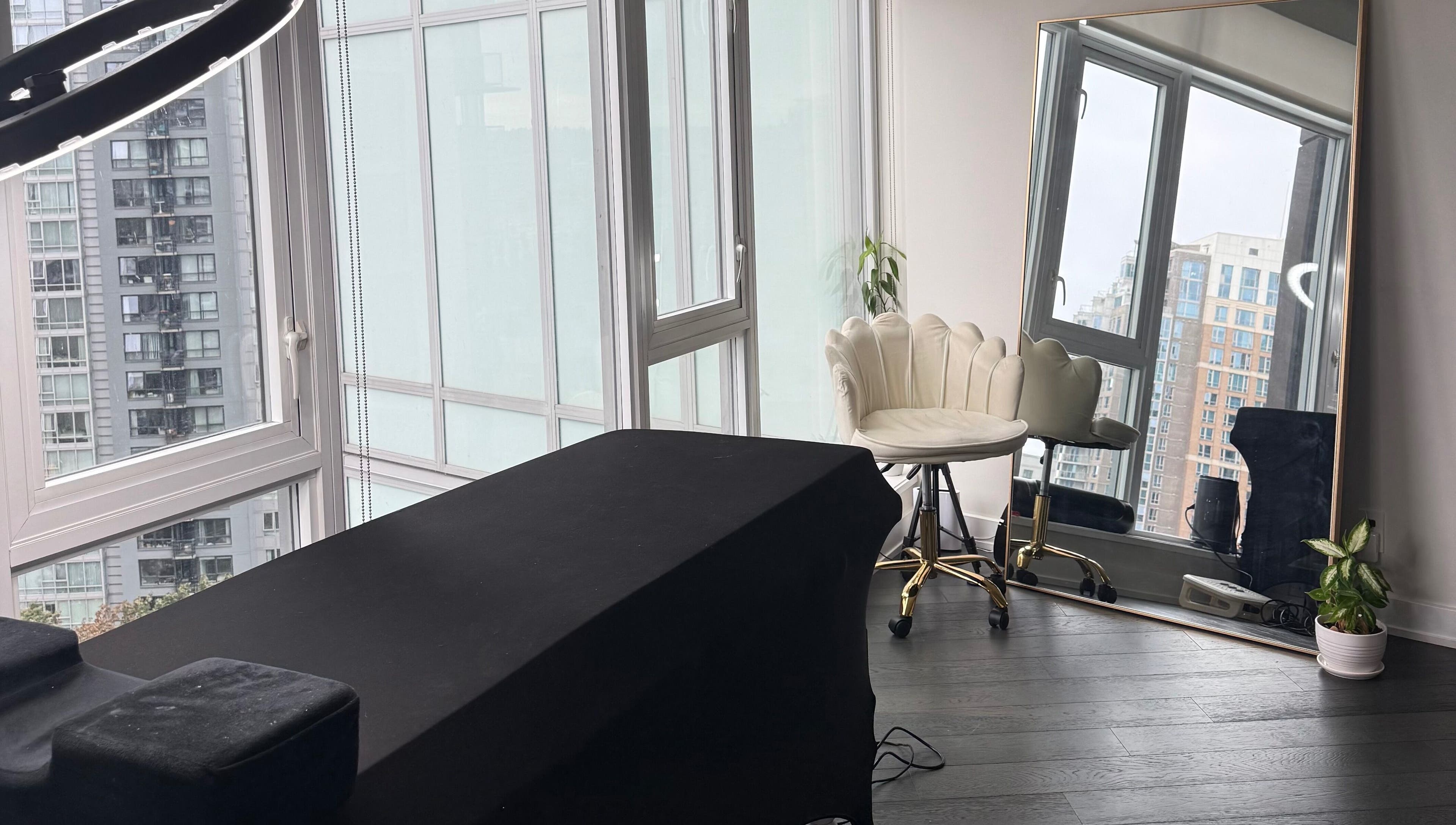 Bright beauty room at GlowBrows Phi with large windows in Vancouver, British Columbia, CA.