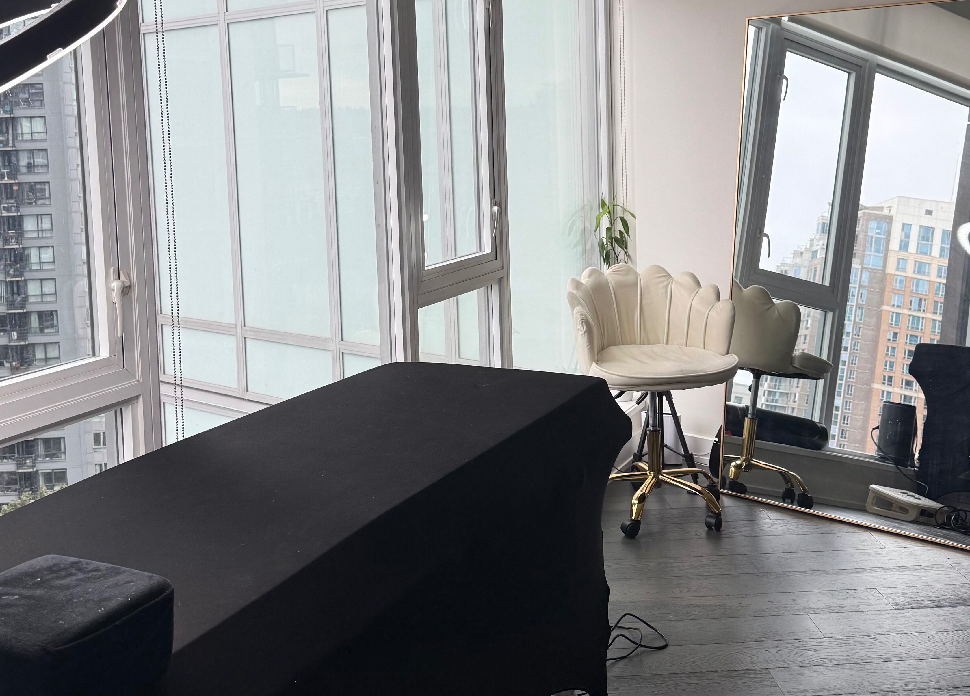 Bright beauty room at GlowBrows Phi with large windows in Vancouver, British Columbia, CA.