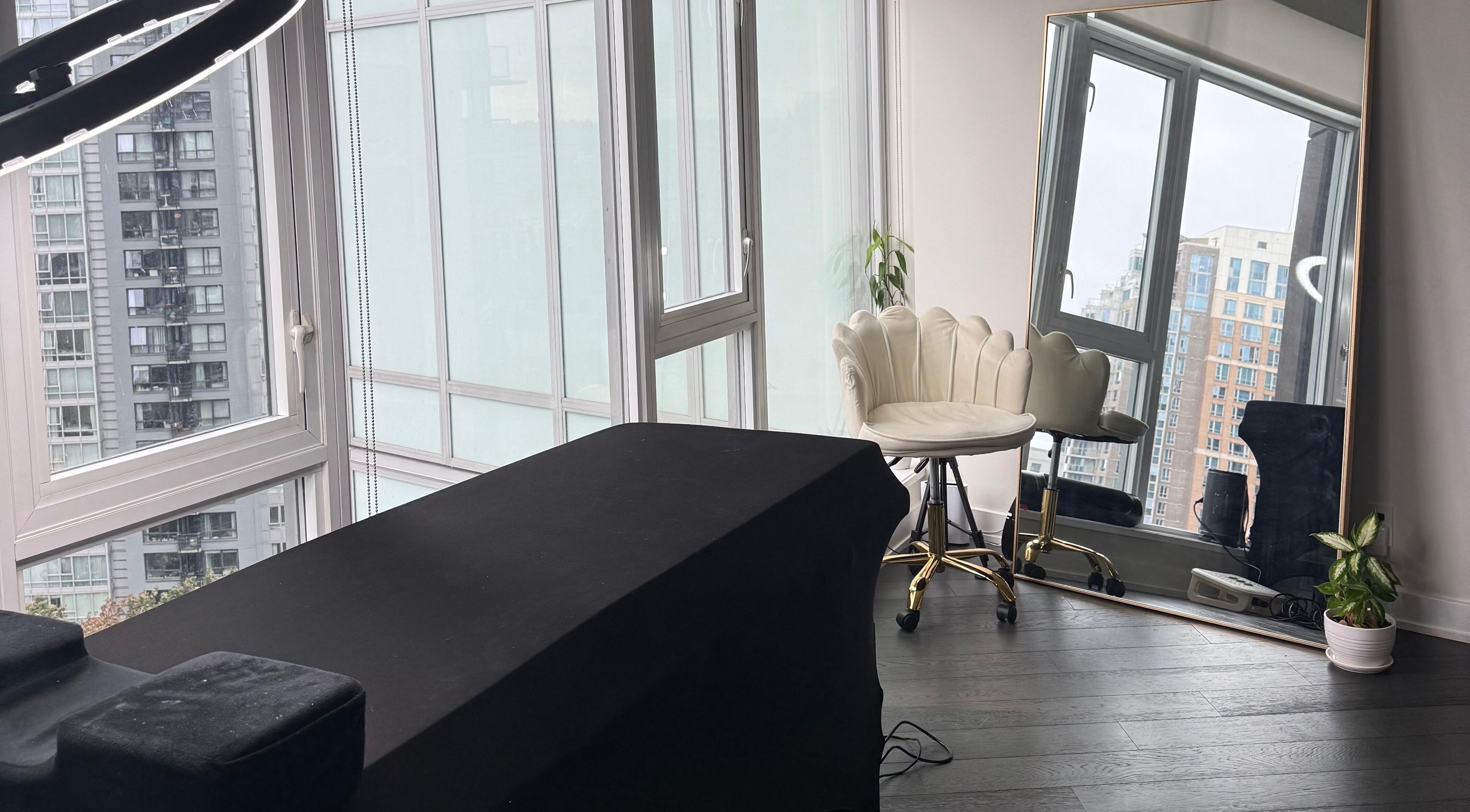 Bright beauty room at GlowBrows Phi with large windows in Vancouver, British Columbia, CA.