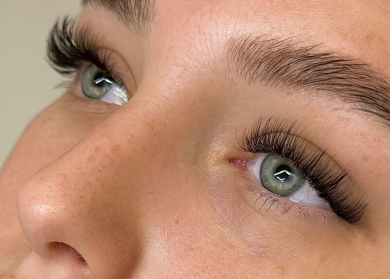Closeup of enhanced lashes and brows at GlowBrows Phi, Vancouver, British Columbia, CA.