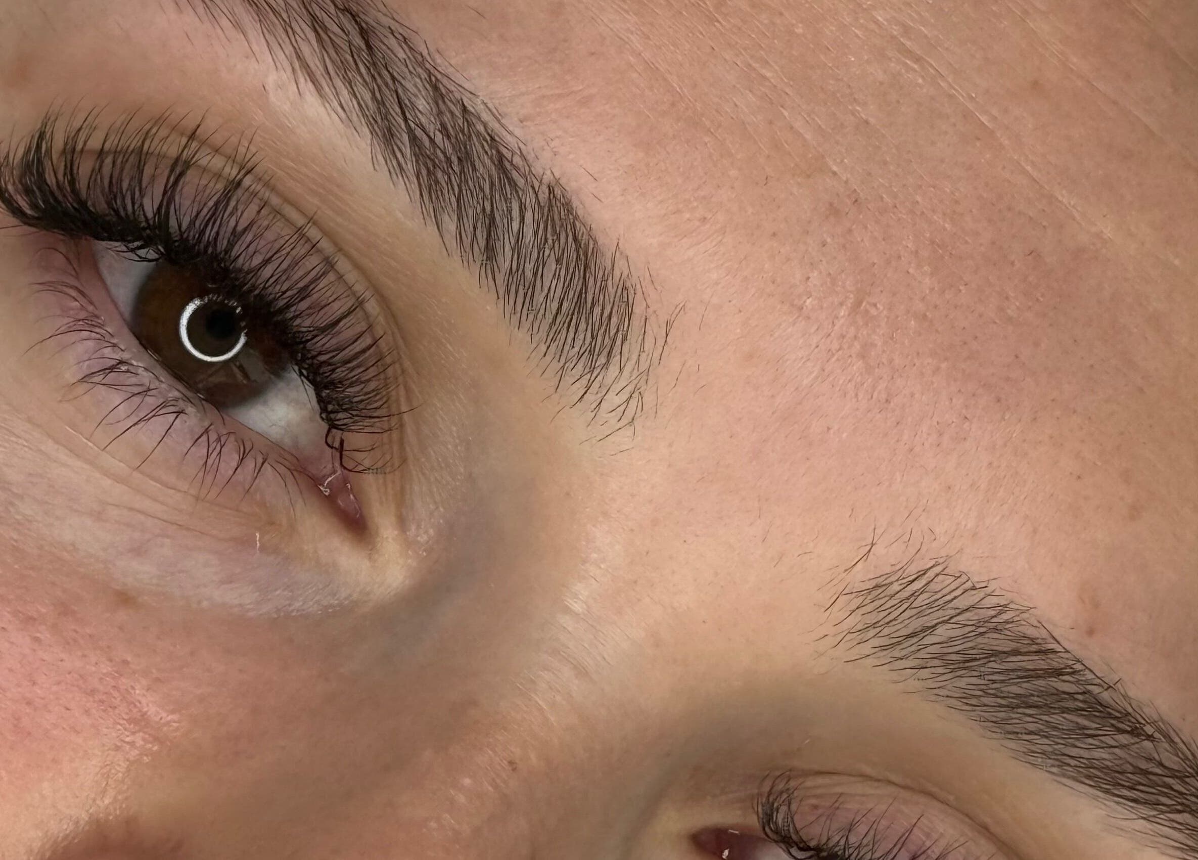 Close-up of expertly shaped brows and lashes at GlowBrows Phi, Vancouver, British Columbia, CA.