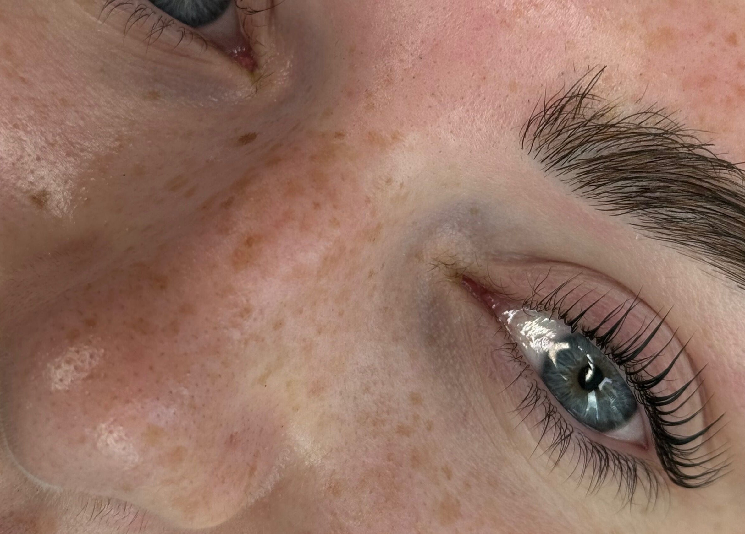 Close-up of expertly shaped eyebrow and lashes at GlowBrows Phi, Vancouver, British Columbia, CA.