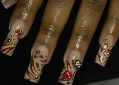 Elegant nail art with gold beads at CZR Nails, London, England, GB, showcasing unique designs.