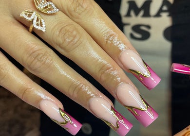 Detailed nail art with pink and gold design at CZR Nails, London, England, GB.