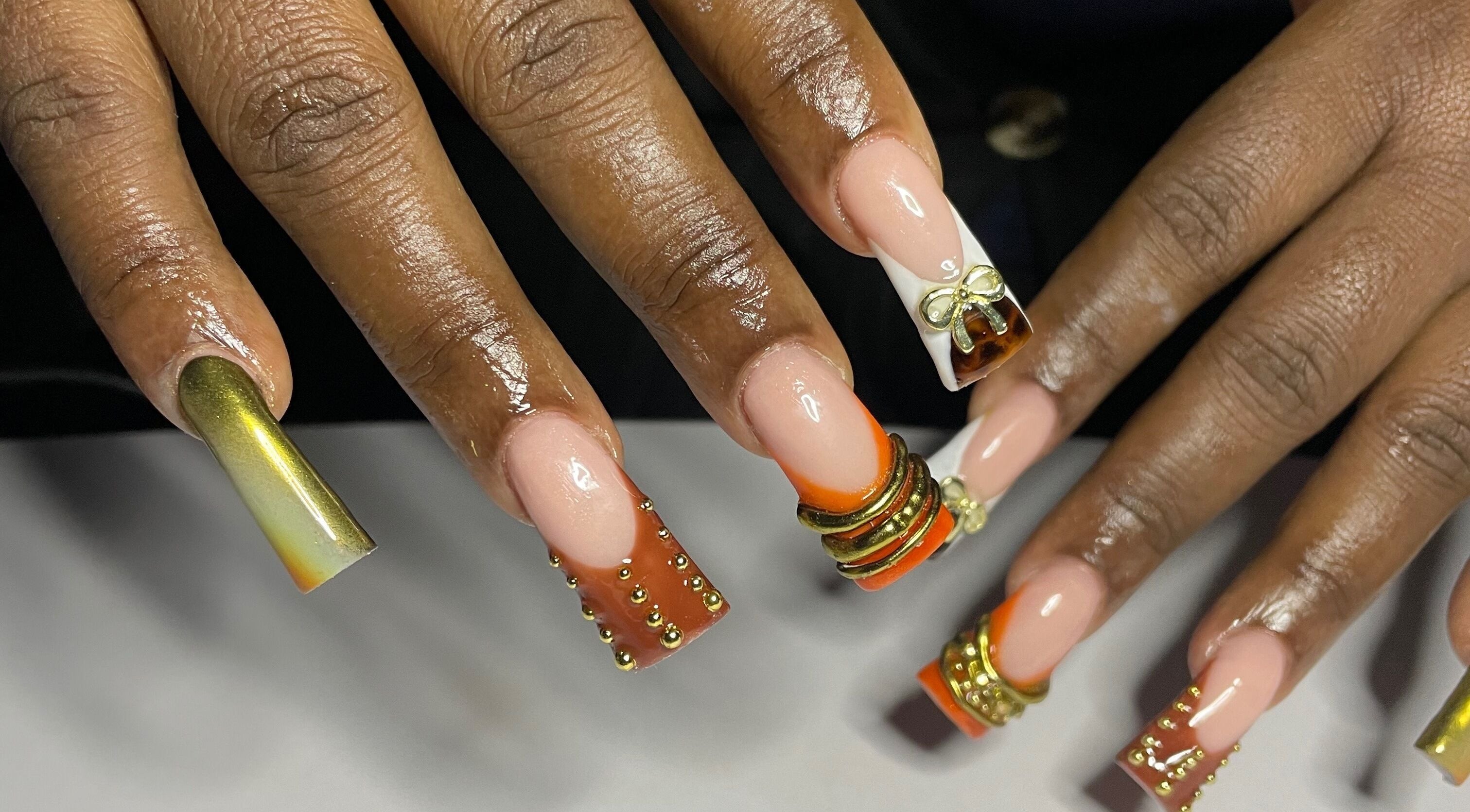 Artistic nail design with embellishments at CZR Nails in London, England, GB.