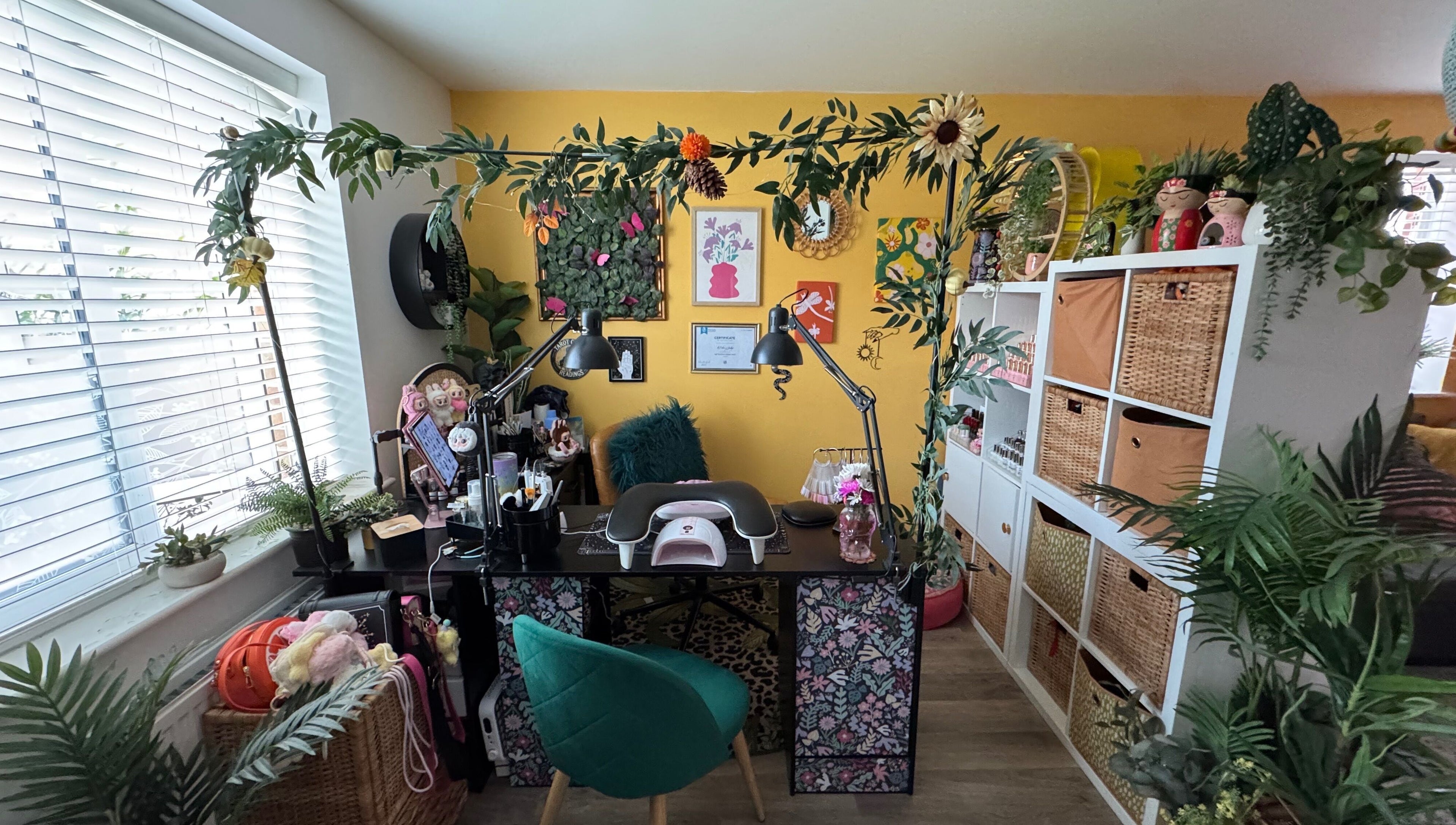 Cozy nail studio at Nails by Estee, Horsham, England, GB featuring vibrant decor and professional equipment.