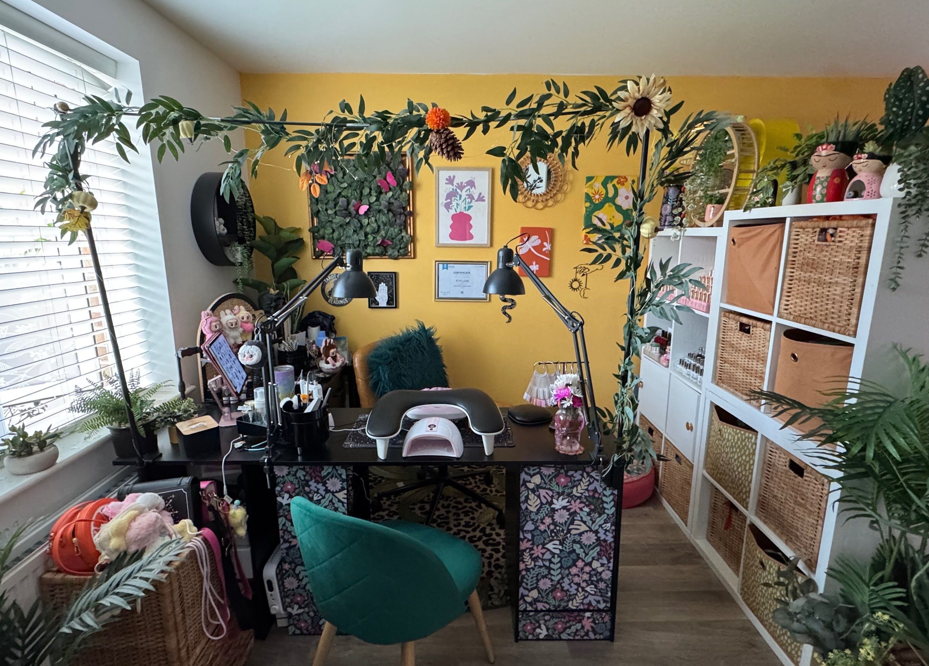 Cozy nail studio at Nails by Estee, Horsham, England, GB featuring vibrant decor and professional equipment.