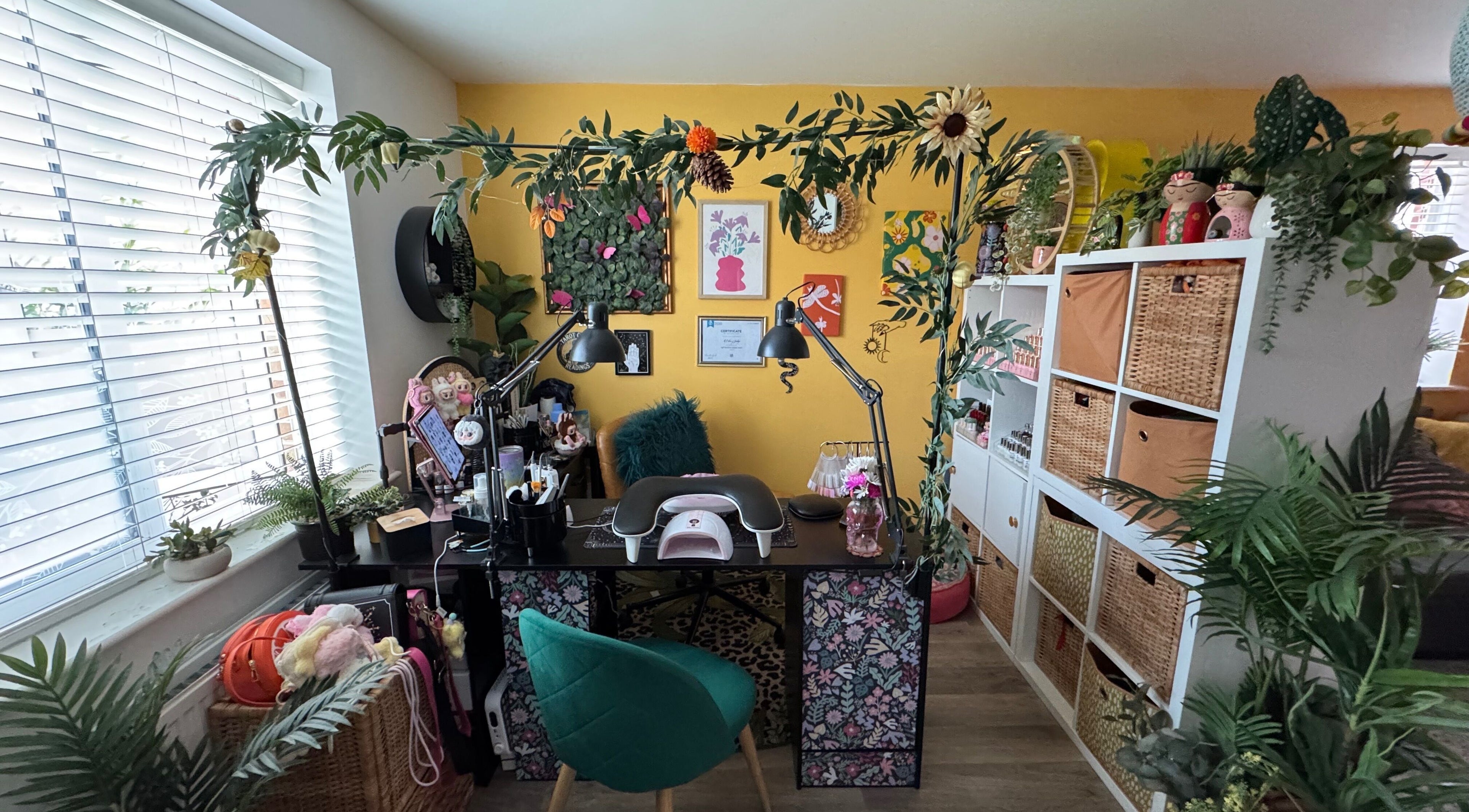 Cozy nail studio at Nails by Estee, Horsham, England, GB featuring vibrant decor and professional equipment.