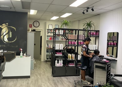 Chiko's Hair and Beauty Salon in Smithfield, Queensland, AU showcasing a stylist at work in a modern setup.