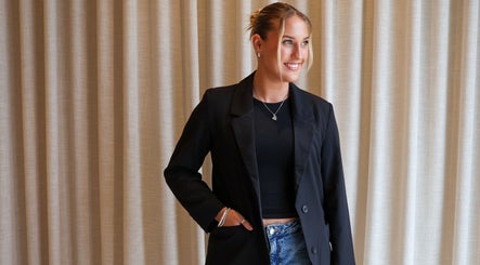 Stylish woman in black at Pure Beauty, Baxter, Victoria, AU.