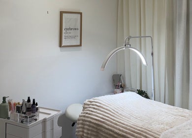 Cozy treatment room at Pure Beauty, Baxter, Victoria, AU with a plush bed and beauty tools.