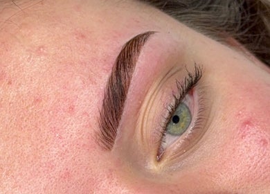 Perfectly shaped eyebrows at Pure Beauty in Baxter, Victoria, AU, highlighting detailed beauty treatments.
