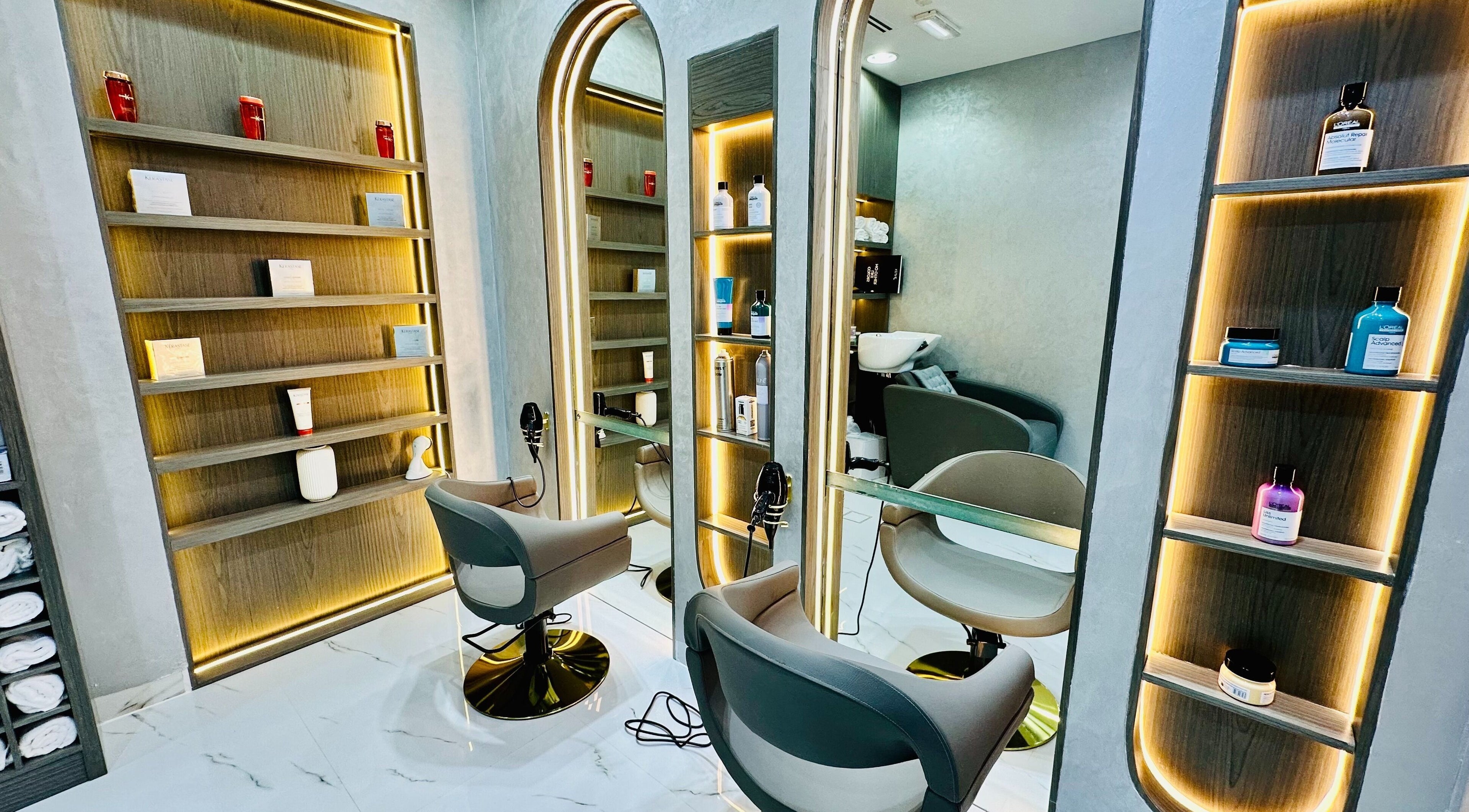 Luxurious beauty venue interior at Shatha Beauty & Spa, دبي, دبي, AE, with stylish chairs and product displays.