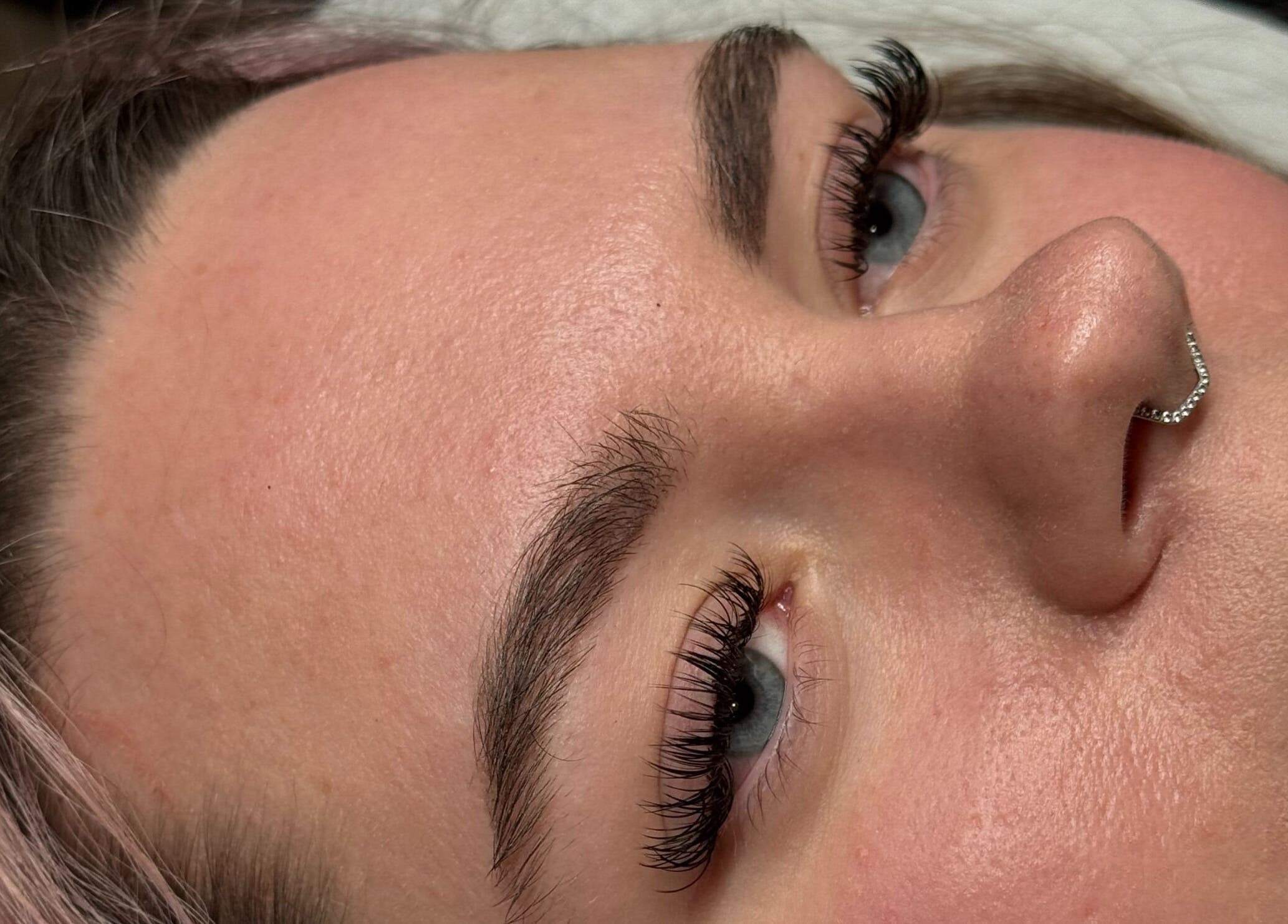 Close-up of expertly crafted eyelash extensions at The Lash Lounge, Melton Constable, England, GB.