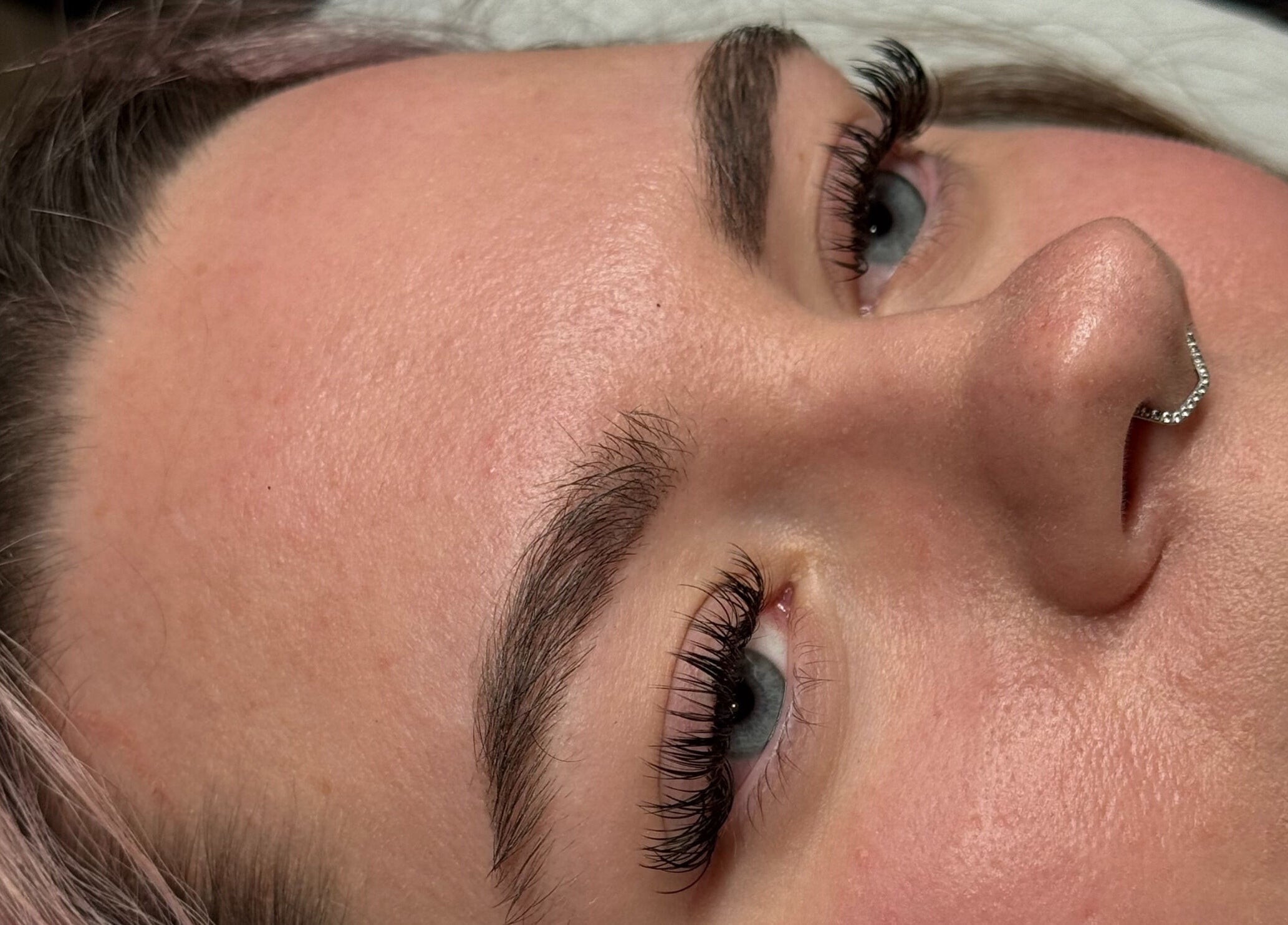 Close-up of expertly crafted eyelash extensions at The Lash Lounge, Melton Constable, England, GB.