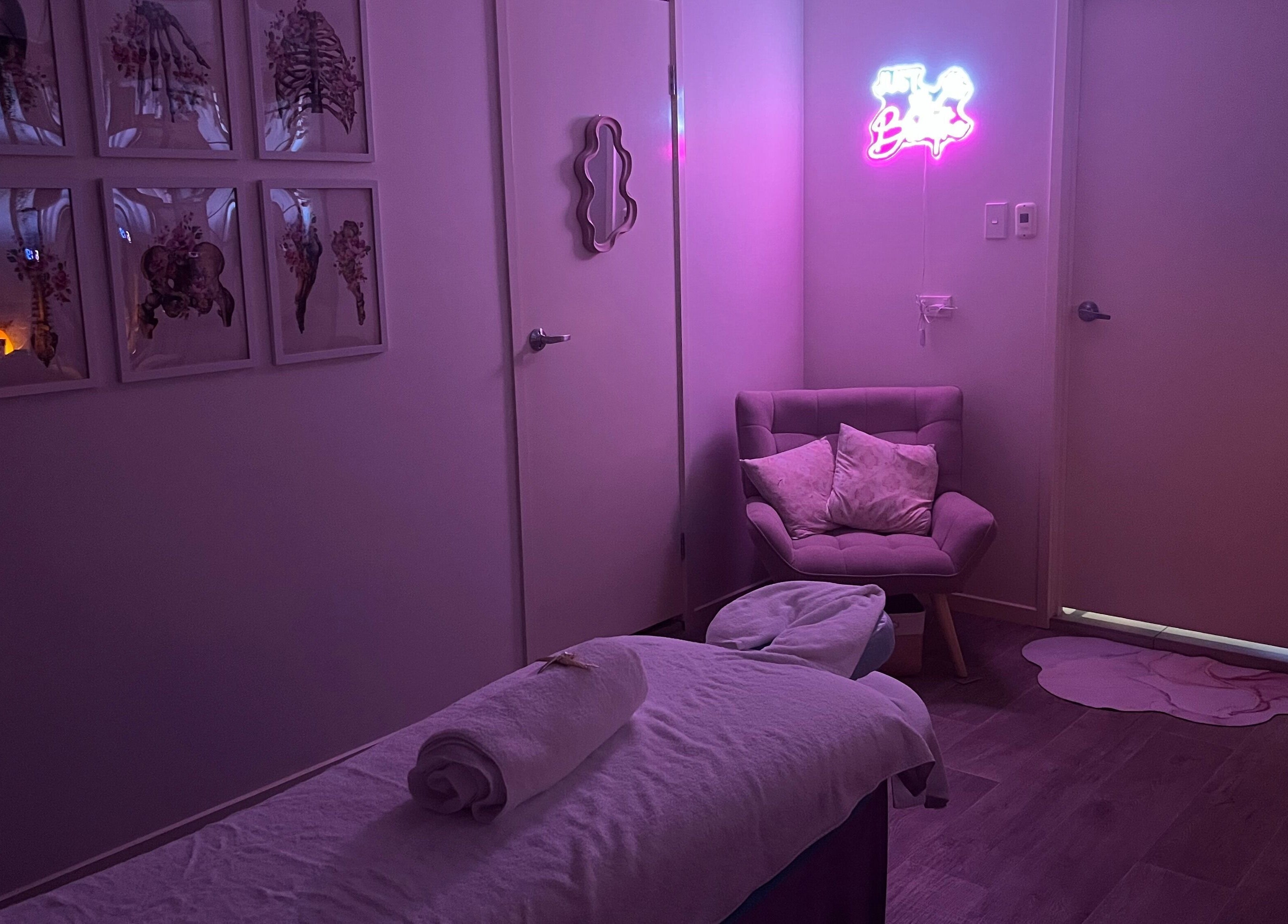 Tranquil massage room at JRT Remedial Massages, Qld, 4118, AU with cozy chair and soft lighting.