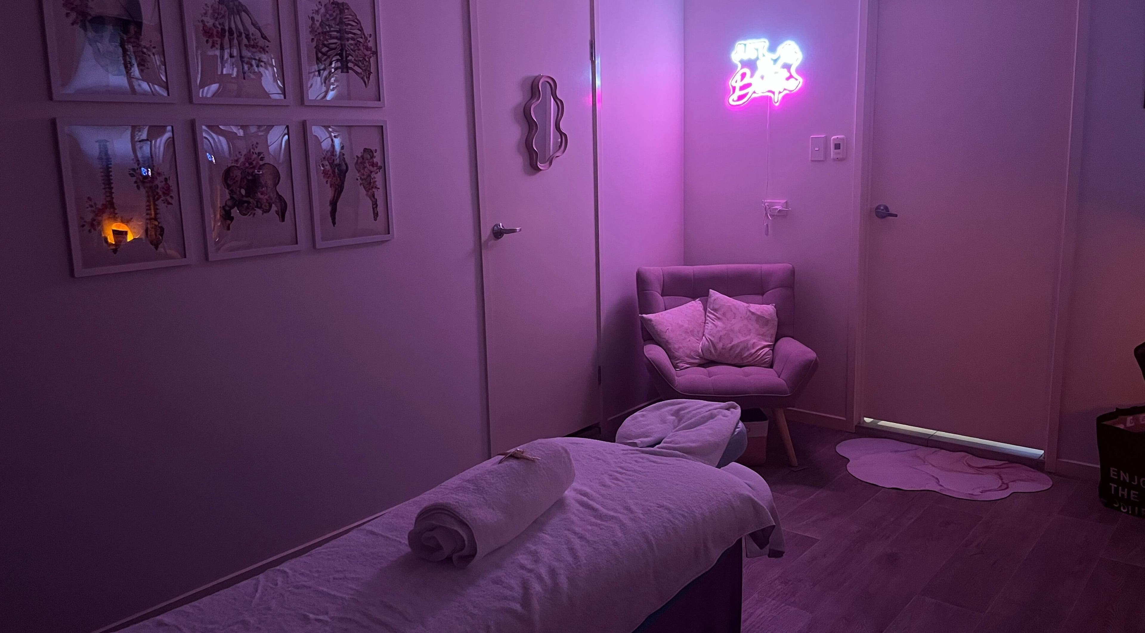 Tranquil massage room at JRT Remedial Massages, Qld, 4118, AU with cozy chair and soft lighting.