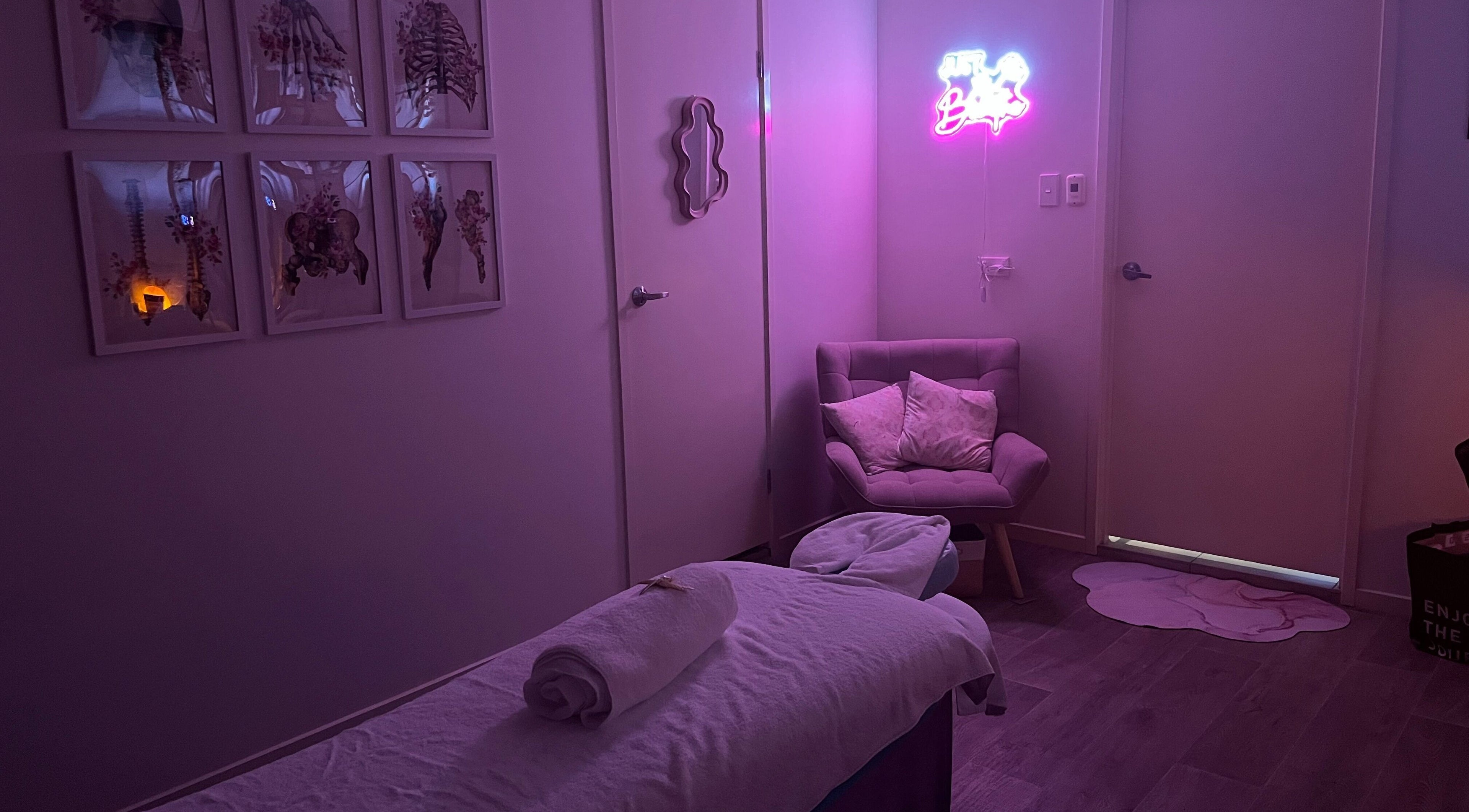 Tranquil massage room at JRT Remedial Massages, Qld, 4118, AU with cozy chair and soft lighting.