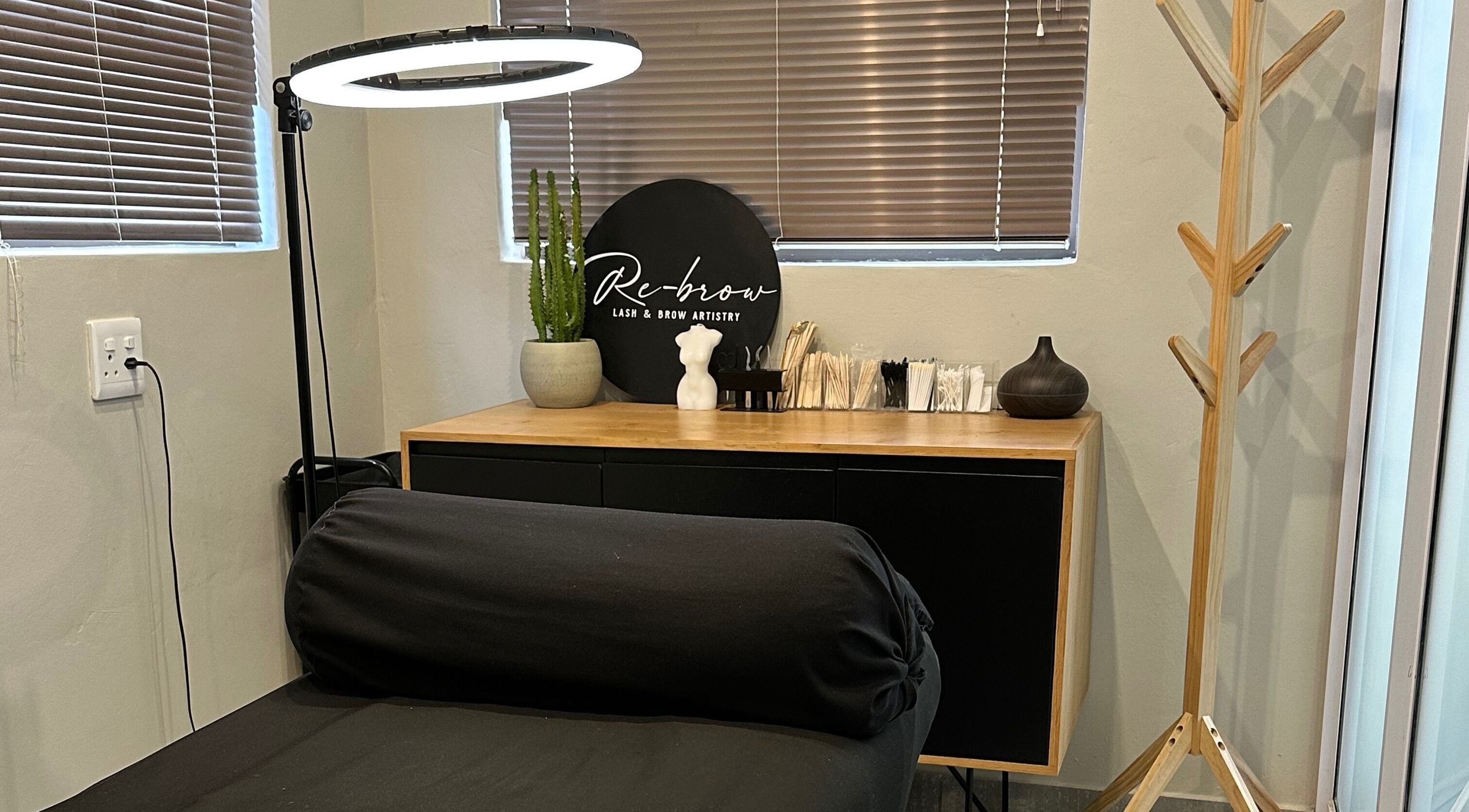 Peaceful corner inside Re Brow Lash & Brow Artistry, Cape Town, Western Cape, ZA with a treatment bed.