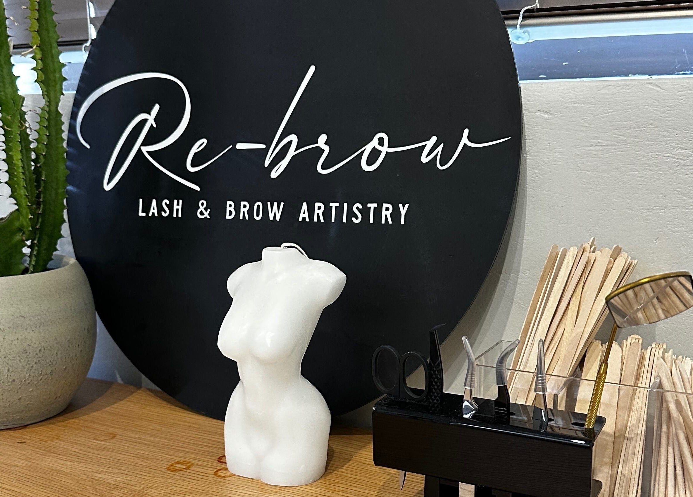 Re Brow Lash & Brow Artistry ambiance in Cape Town, Western Cape, ZA featuring decor and tools.
