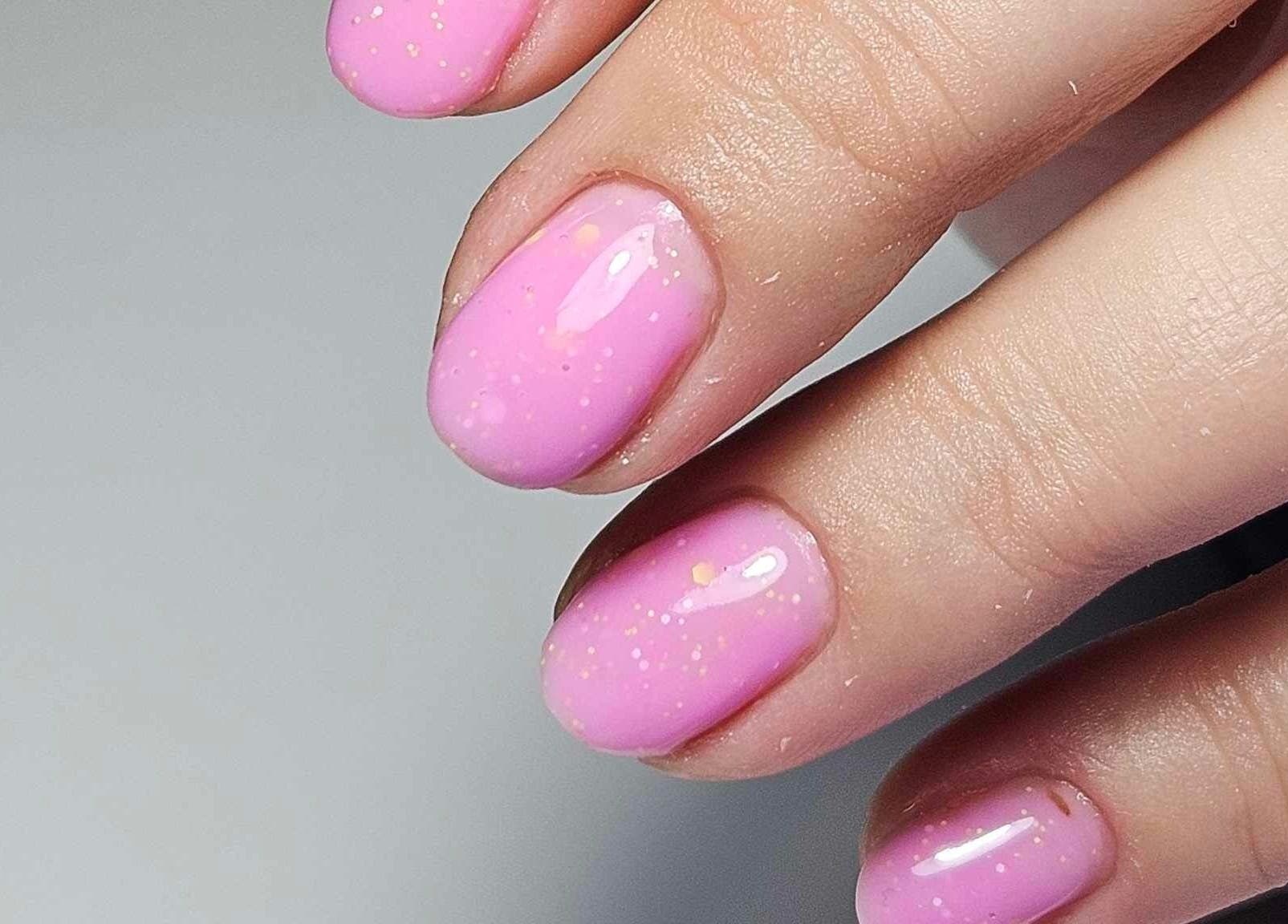 Close-up of sparkling pink nails at The Beauty Lounge by M, Dublin, County Dublin, IE.