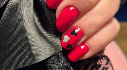 Red manicure with heart design at The Beauty Lounge by M, Dublin, County Dublin, IE.